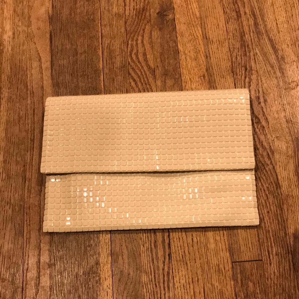 Women’s ivory colored dinner clutch